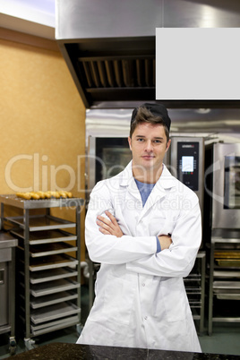 baker standing in his kitchen