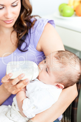 mother feeding her newborn child