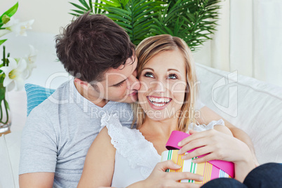 man and girlfriend after giving her a present