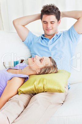 couple relaxing together on the sofa