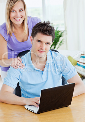 couple using a laptop