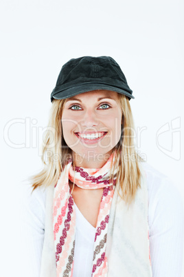 blond woman with cap and scarf