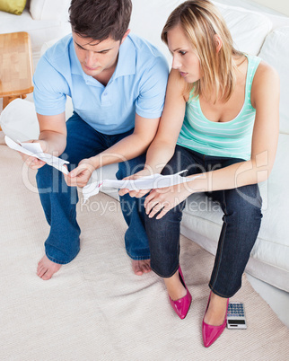 couple looking at bills