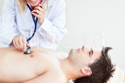 doctor feeling the breathing of a patient