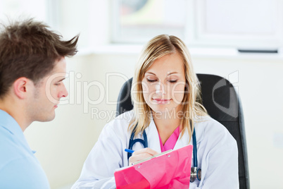 female doctor writing a prescription