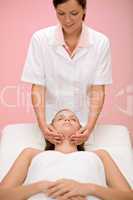 Body care - woman facial massage