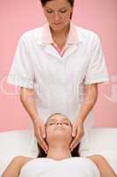 Body care - woman facial massage