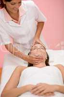 Body care - woman facial massage