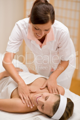 Luxury care - woman at cleavage massage