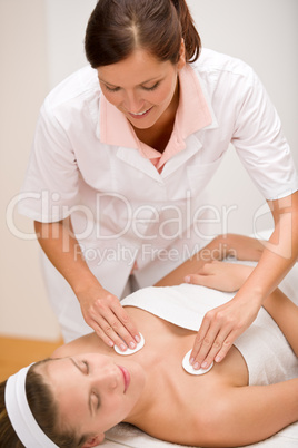 Luxury care - woman at cleavage cleaning