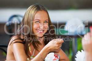 smiling girl eating ice scream