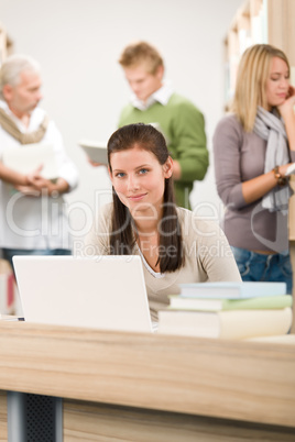 High school library - Student with laptop