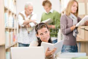 High school library - Student with book