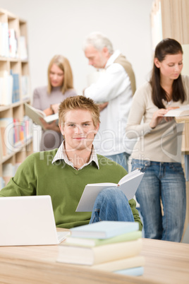 High school library - Student with book