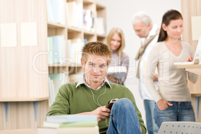 High school library - student with headphones