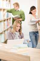 High school library - student with laptop