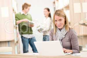 High school library - student with laptop