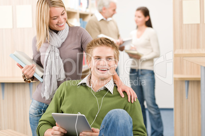 Touch screen tablet computer - students in library