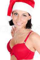 Portrait of beautiful woman in red santa hat