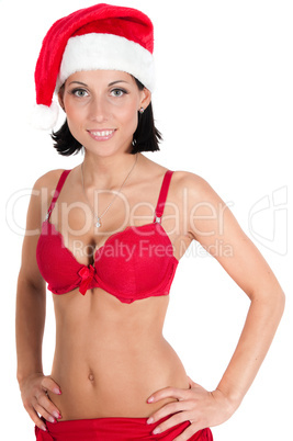 Portrait of beautiful woman in red santa hat