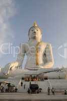 Big seated whithe Buddhas figure