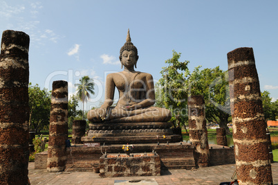 Buddha's figure in the historical park of Sukhothai