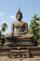 Buddha's figure in the historical park of Sukhothai