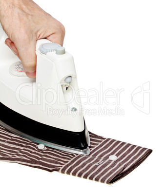 Male hand ironing shirt