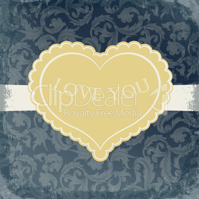 Golden vintage gift card with heart shaped copyspace.