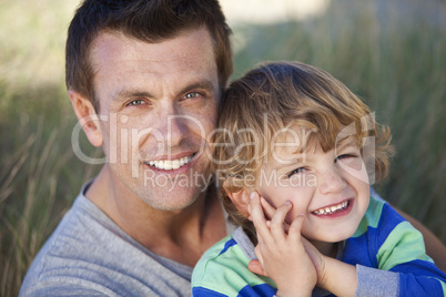 Man & Boy, Father and Son Having Fun At Beach