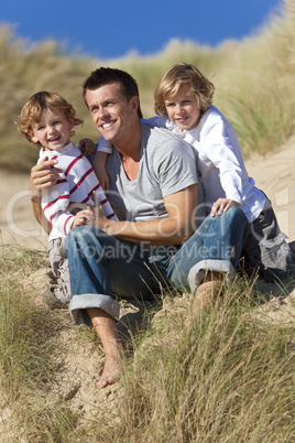 Man & Two Boy, Father and Sons Having Fun At Beach