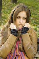 Girl with headphones fall