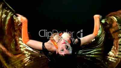 Arabic dancer sit, flap with gold wing