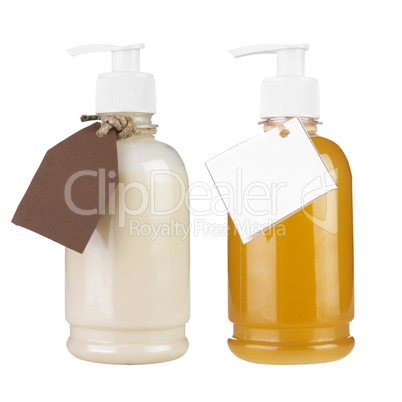 Two plastic bottles of body care
