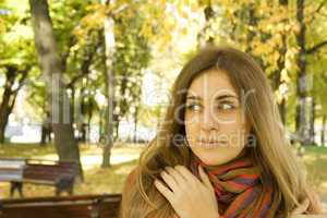 Autumn portrait of a beautiful young woman