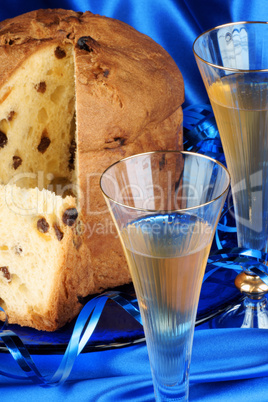 Italian Christmas composition with panettone and spumante