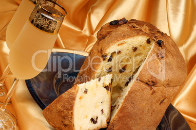 Italian Christmas composition with panettone and spumante