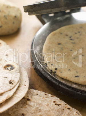 Chapatti Press with Chapatti Breads