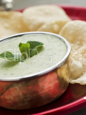 Fresh Green Yoghurt Chutney with mini Papadoms