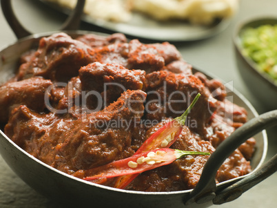 Meat Phall in Karahi with Naan and Green Chilli Curry