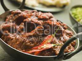 Meat Phall in Karahi with Naan and Green Chilli Curry