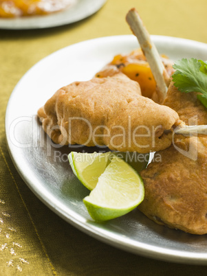 Kashmiri Lamb Cutlets with Lime Wedges and Mango Chutney