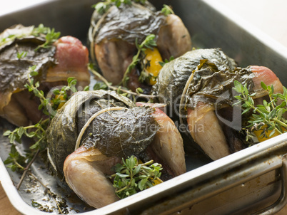 Quails Roasted in Vine Leaves with Lemon and Thyme