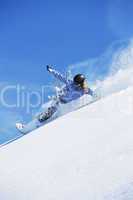 Young woman snowboarding