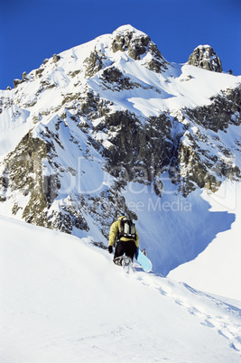 Young woman snowboarding