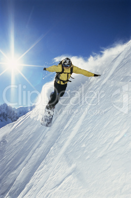 Young woman snowboarding