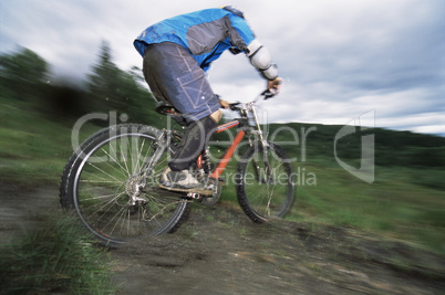 Young man mountain biking