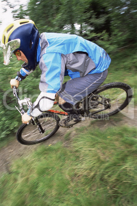 Young man mountain biking