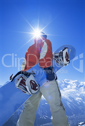 Young man with snowboard