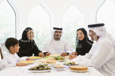 A Middle Eastern family enjoying a meal